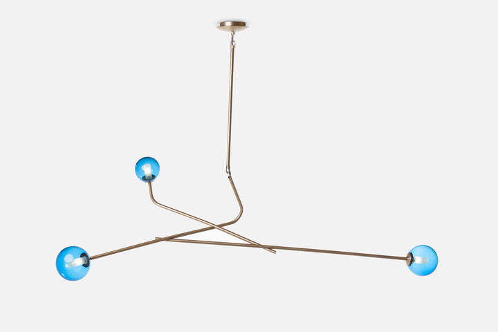 BRUSHED BRASS AND BLUE GLASS